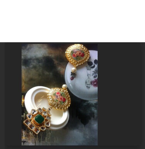 Print therapy kundan and floral earrings